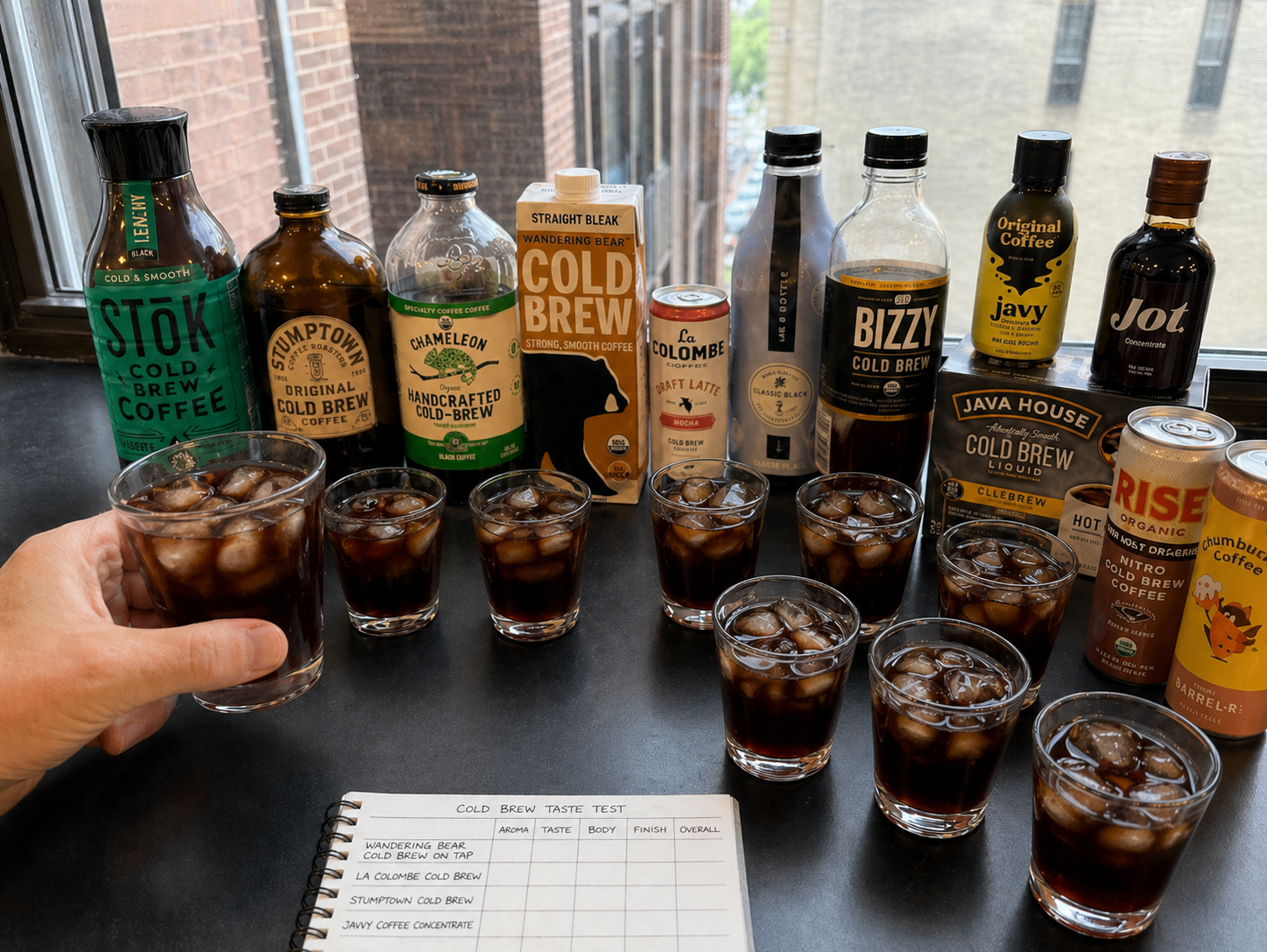 All cold brew products lined up on a marble counter